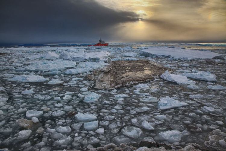 storm brewing behind icebreaker